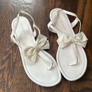 White bow sandals Christian Siriano